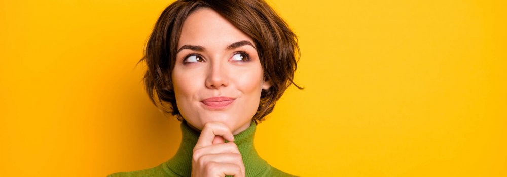 Closeup photo of amazing short hairdo lady looking up empty space deep thinking creative person arm on chin wear casual green turtleneck isolated yellow color background